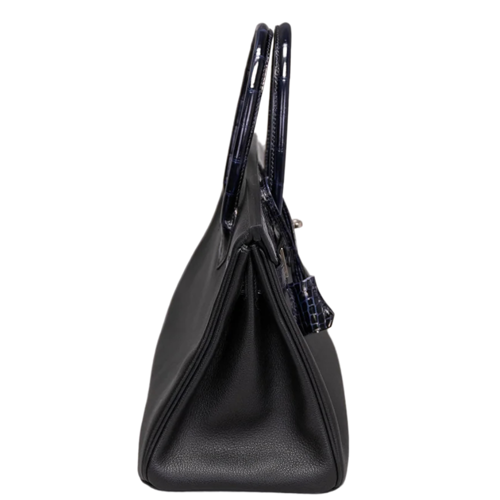 Hermes Birkin 30 Touch Blue Indigo left side profile, displaying the supple side gussets and brilliant shine of the exotic crocodile touch accents.