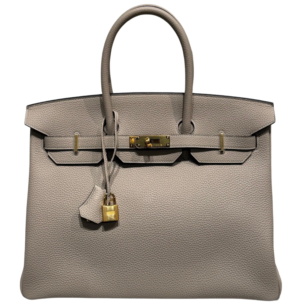 Hermes Birkin 35 Gris Tourterelle Togo front view, showcasing the iconic trapezoidal shape, neutral grey leather, dual top handles, and gold turn-lock hardware.