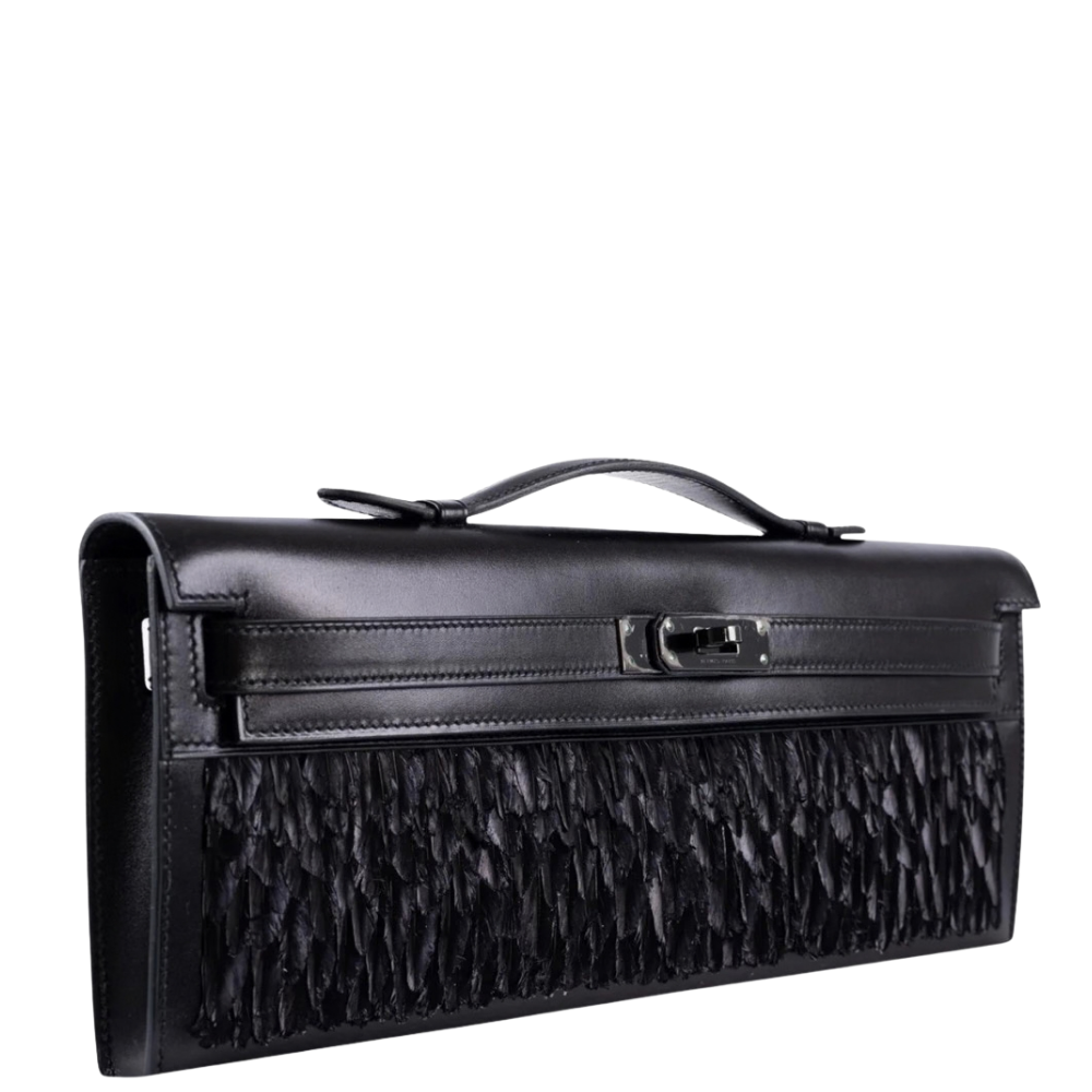 Hermes Kelly Cut Black Box Leather and Feathers left side profile, displaying the slender structural gusset.