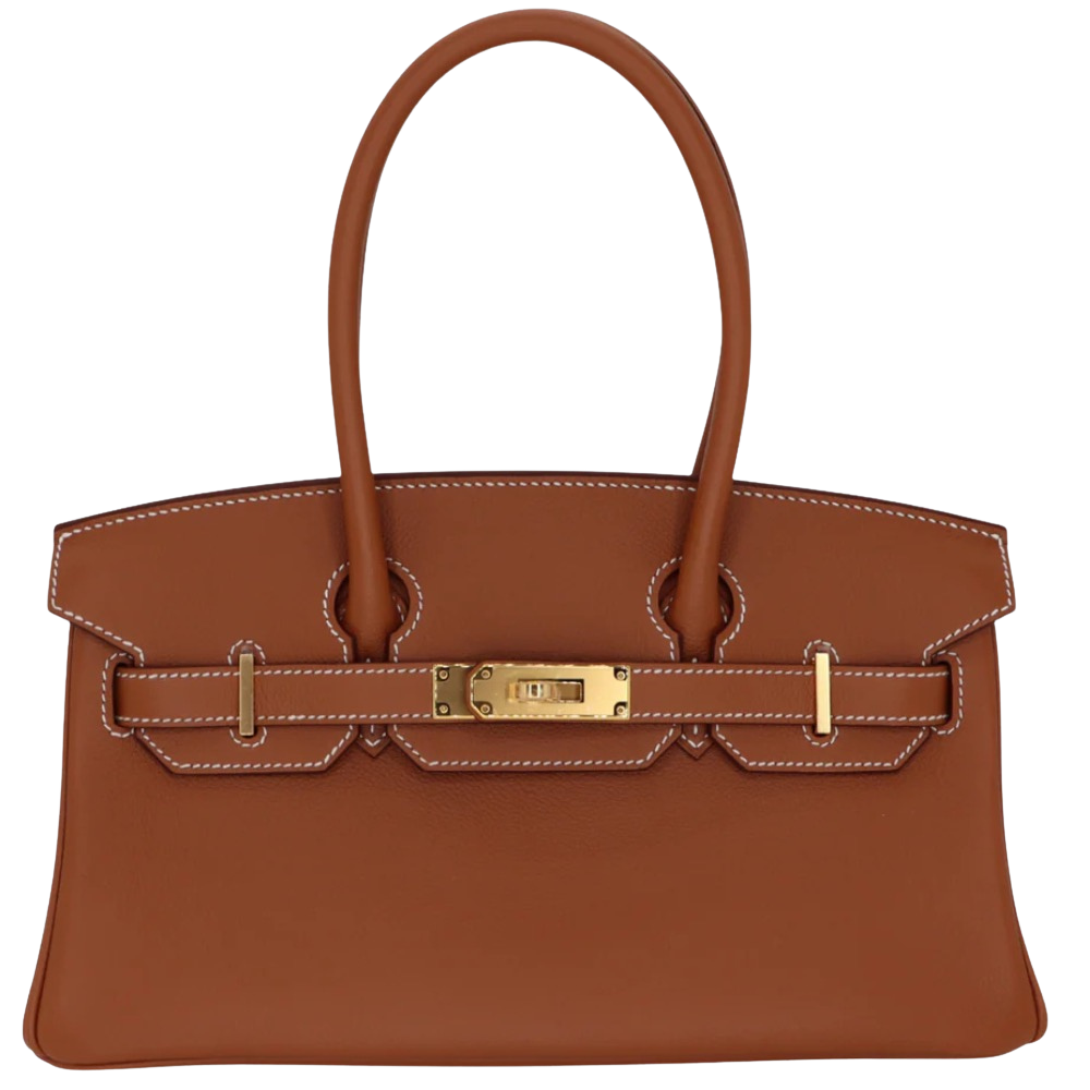 Hermes Shoulder Birkin 29 Gold Evercolor front view, showcasing the elongated horizontal silhouette, classic warm tan brown leather, long shoulder handles, and gold turn-lock hardware.