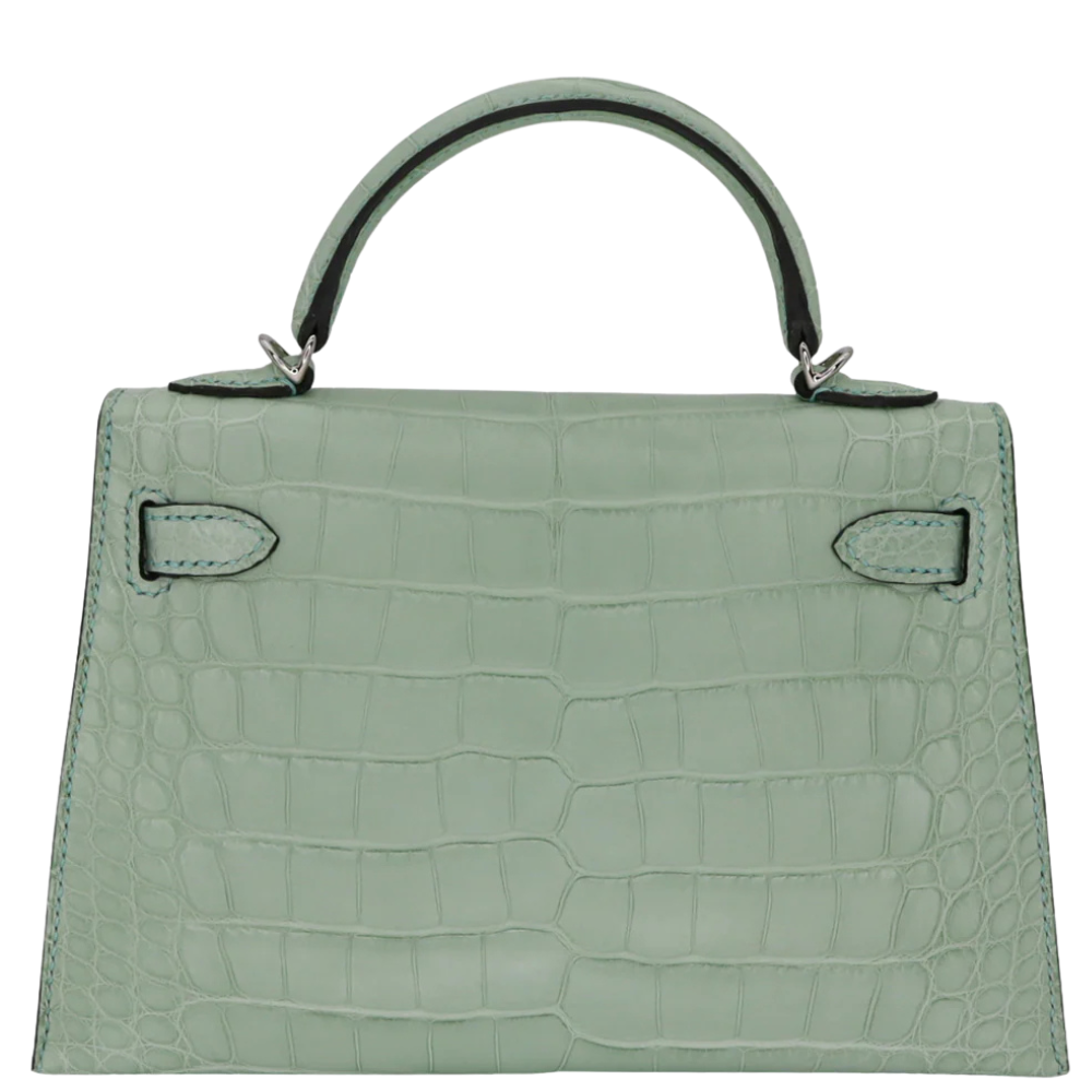 Hermès Kelly 20 handbag in matte alligator leather, Vert d’Eau color, elegant and compact