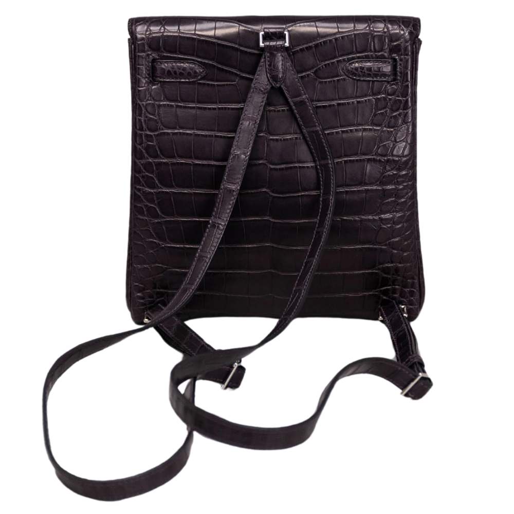 Hermès Kelly Ado backpack in matte alligator leather with silver hardware, luxurious and elegant