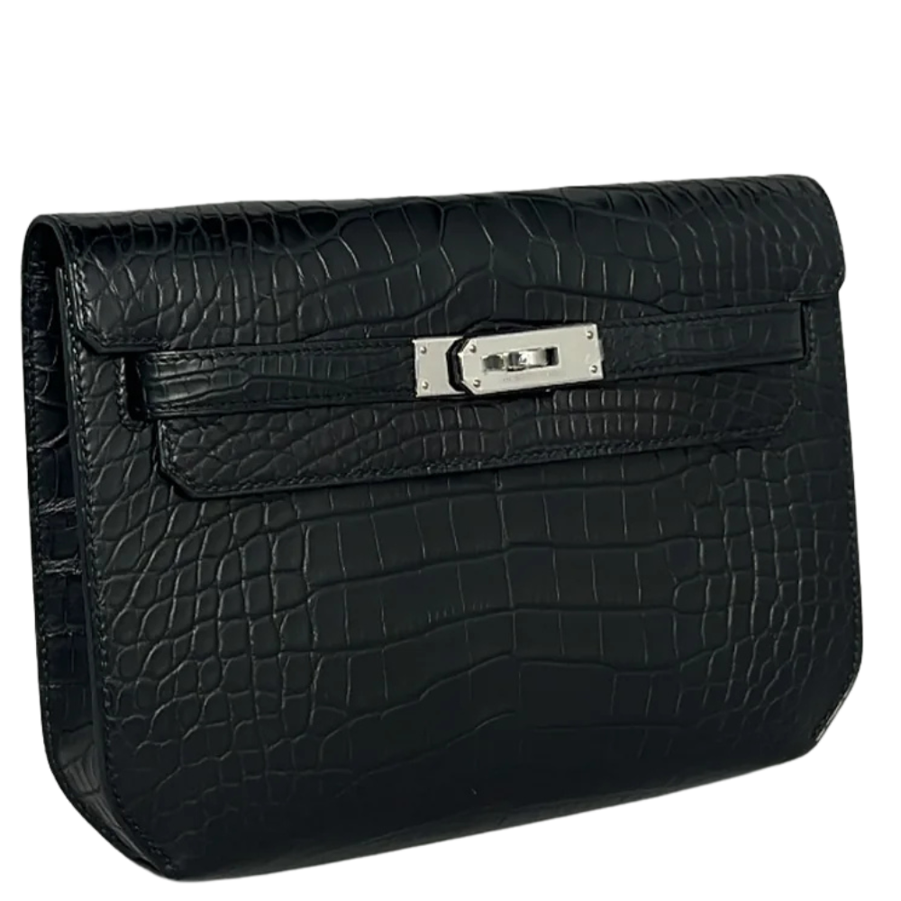 Side view of Hermès Kelly Dépêche in black alligator leather