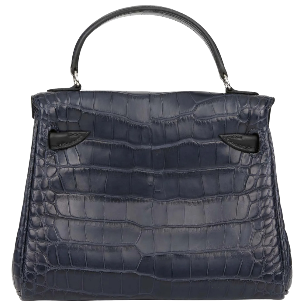 Hermès Kelly Doll handbag in matte alligator crocodile leather, Bleu Indigo color, playful and iconic design