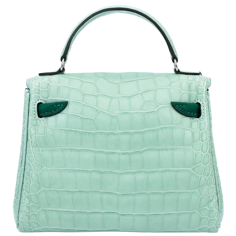 Hermès Kelly Doll handbag in matte alligator leather, Vert d’Eau color, iconic and playful design
