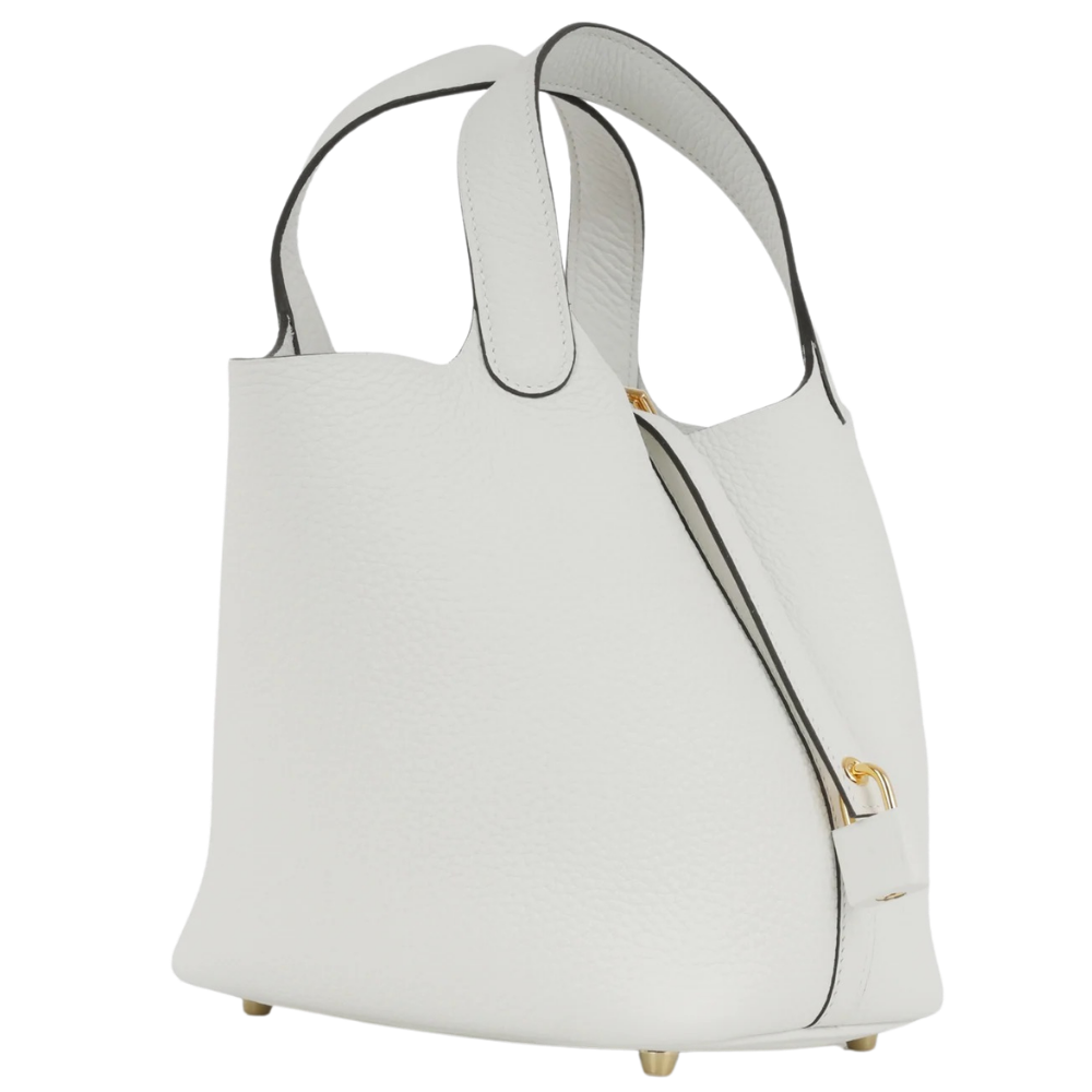 Hermes Picotin 18 New White Taurillon Clemence right side profile, featuring the base design and refined gold hardware details.