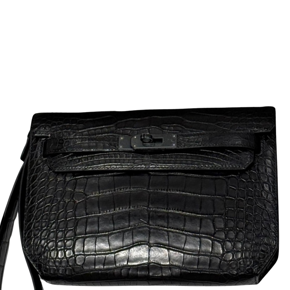 Hermes Kelly 25 Dépêche So Black front view, showcasing the sleek architectural briefcase structure, deep black box leather, and matching matte black turn-lock hardware.