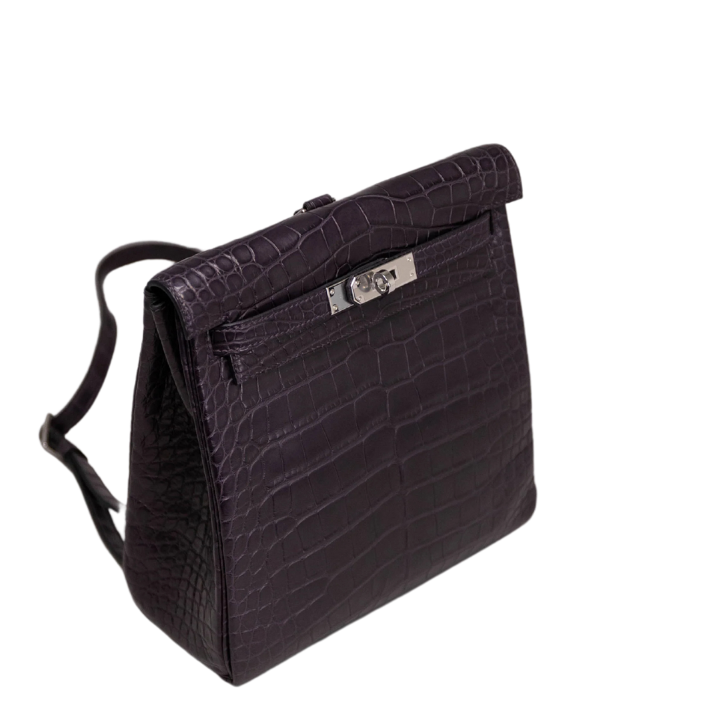 Hermes Kelly Ado 20 Black Matte Alligator left side profile, displaying the refined proportions, gusset depth, and strap attachments.