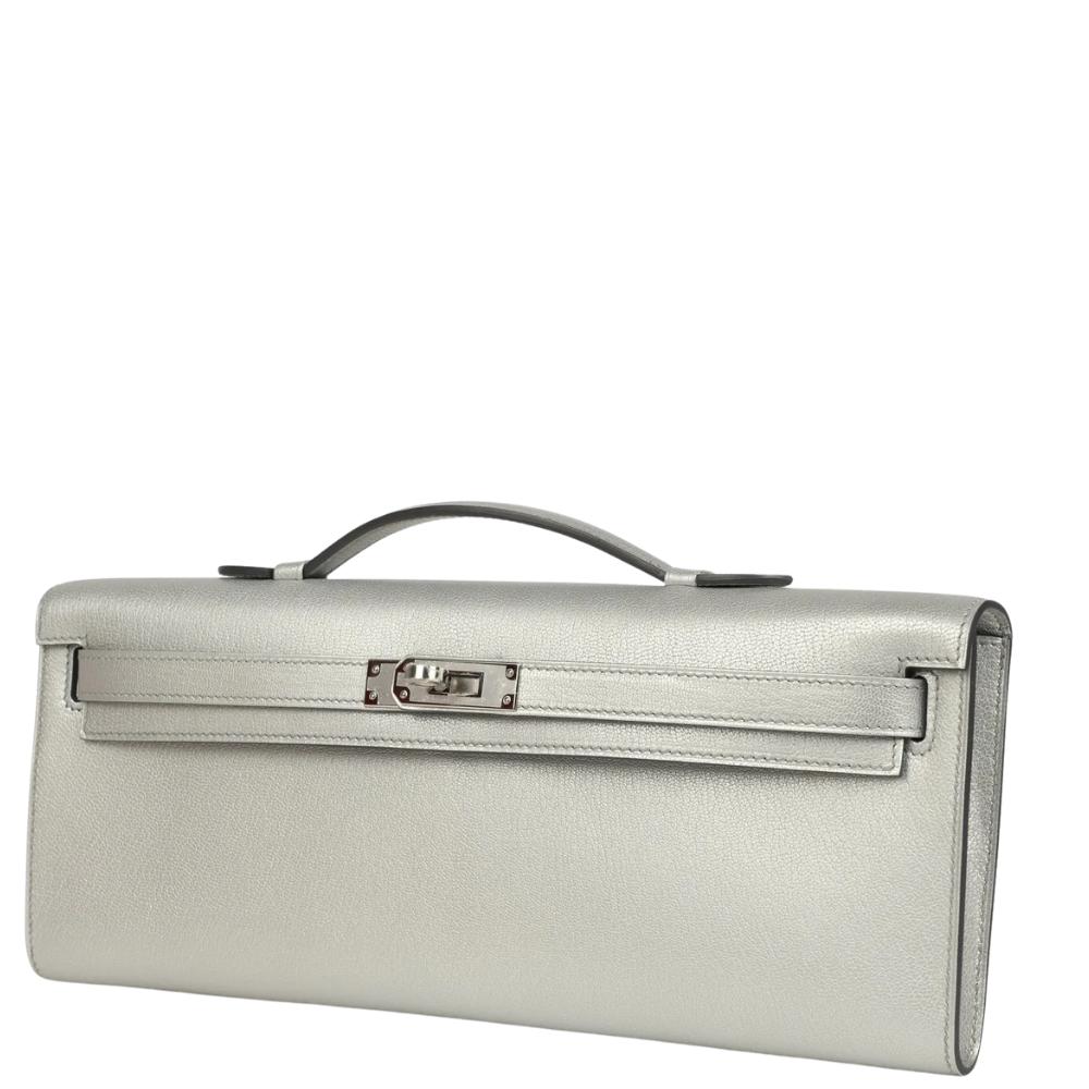 Hermes Kelly Cut Argent Chevre Chamkilight right side profile, featuring the refined palladium hardware and flap details.