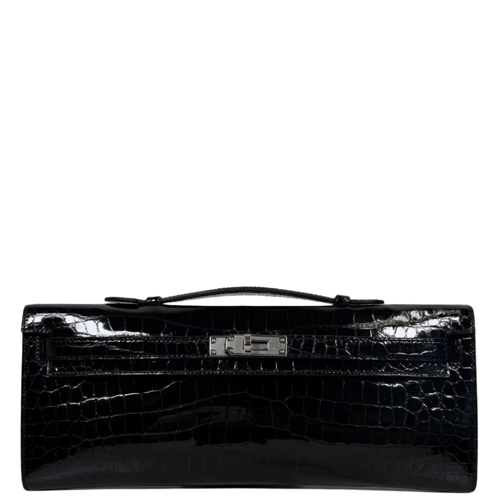 Hermes Kelly Cut Black Shiny Porosus front view, showcasing the elongated silhouette, symmetrical square crocodile scales, and iconic turn-lock closure.