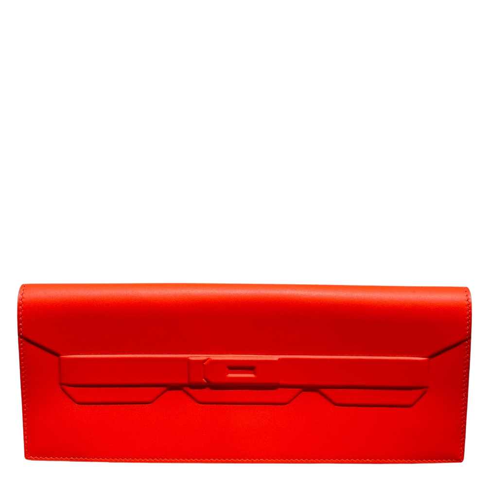 Hermes Kelly Pochette Shadow Orange Swift front view, showcasing the unique debossed trompe-l'œil architectural flap and straps molding in signature Hermès orange.