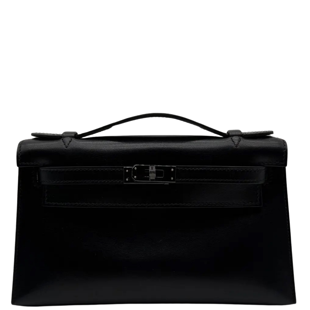 Hermes Kelly Pochette Black Box Calf So Black front view, showcasing the smooth glossy leather and stealth black PVD turn-lock closure.