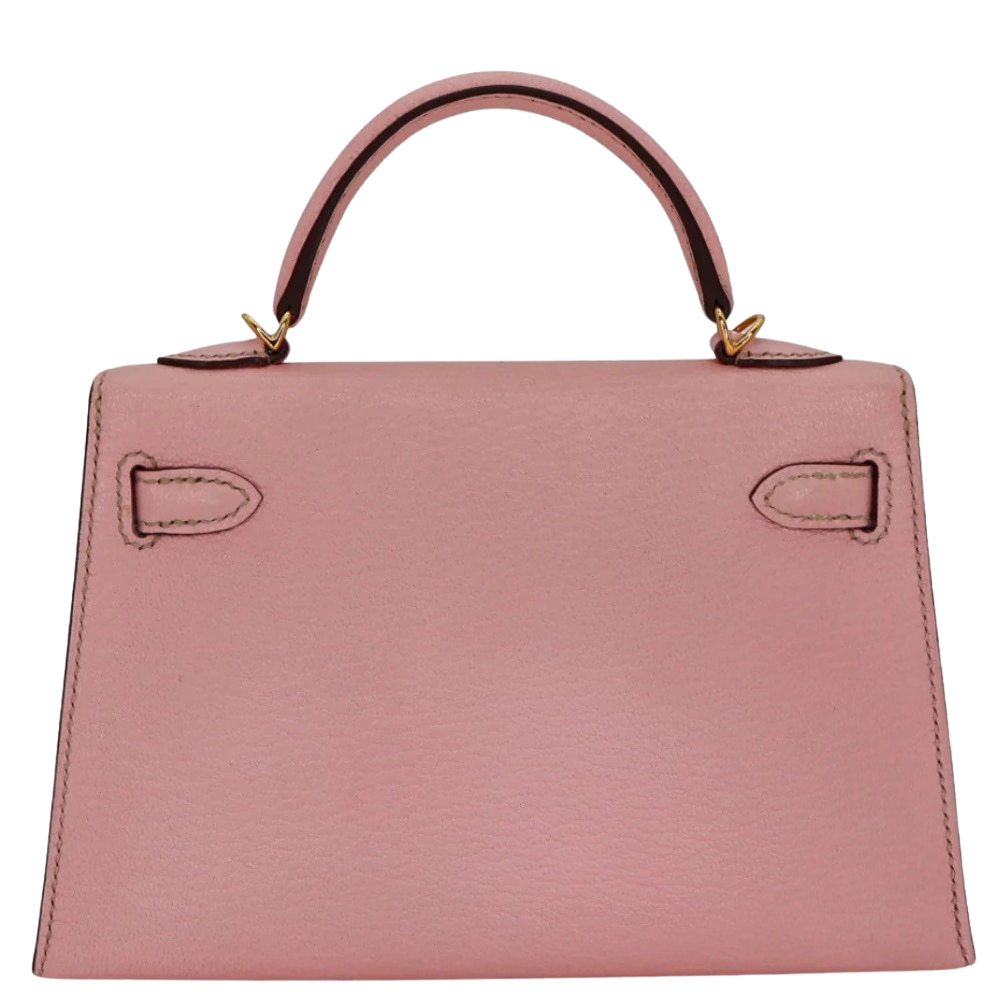Hermes Mini Kelly 20 Sellier Rose Sakura Chevre back view, highlighting the flawless geometric lines and premium goatskin craftsmanship.