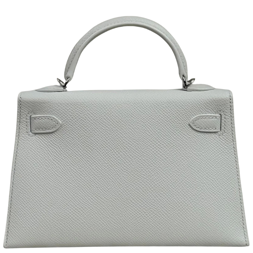 Hermes Kelly 20 Mini New White Epsom back view, highlighting the flawless leather craftsmanship and architectural lines.