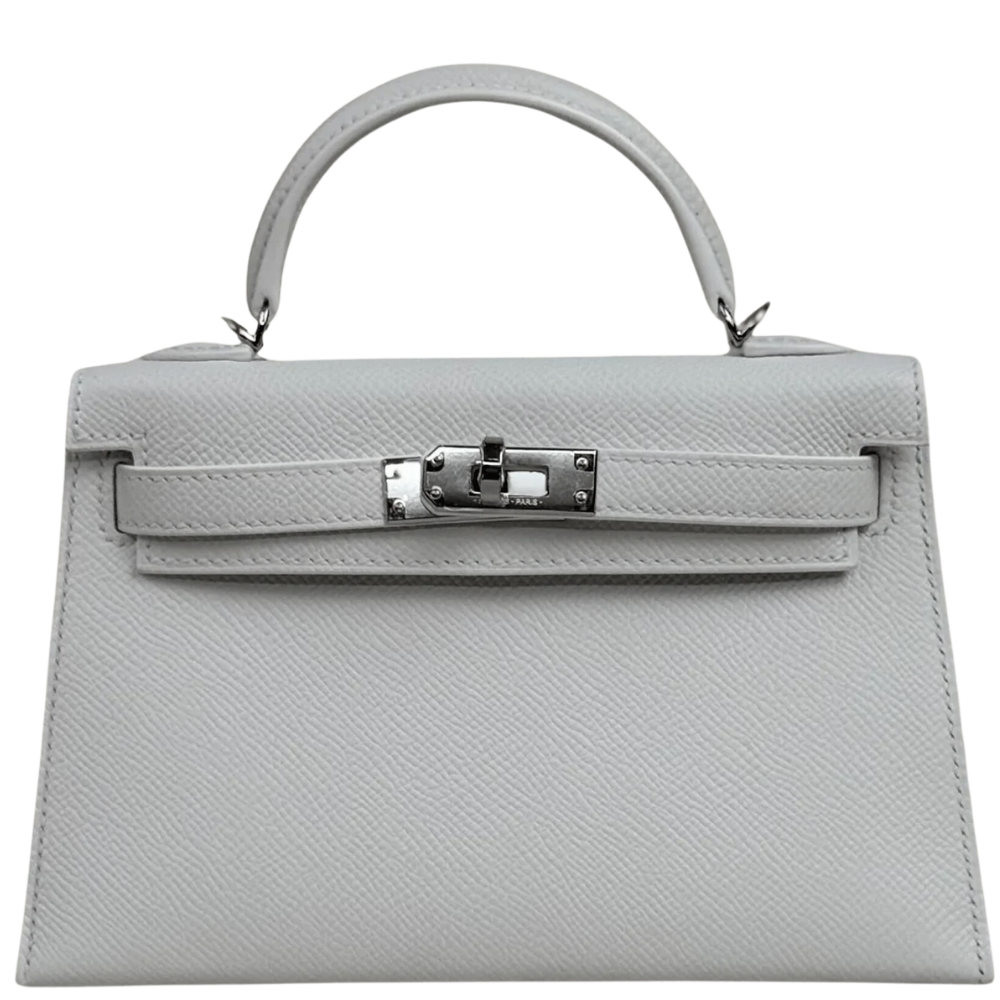 Hermes Kelly 20 Mini New White Epsom front view, showcasing the clean structured Sellier silhouette and iconic turn-lock closure.