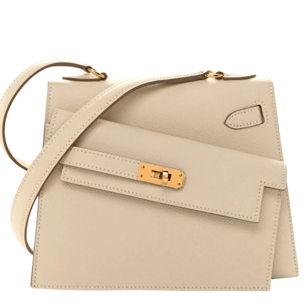 Hermes Kelly 20 Mini En Désordre Craie Epsom front view, showcasing the unique asymmetrical structural design.