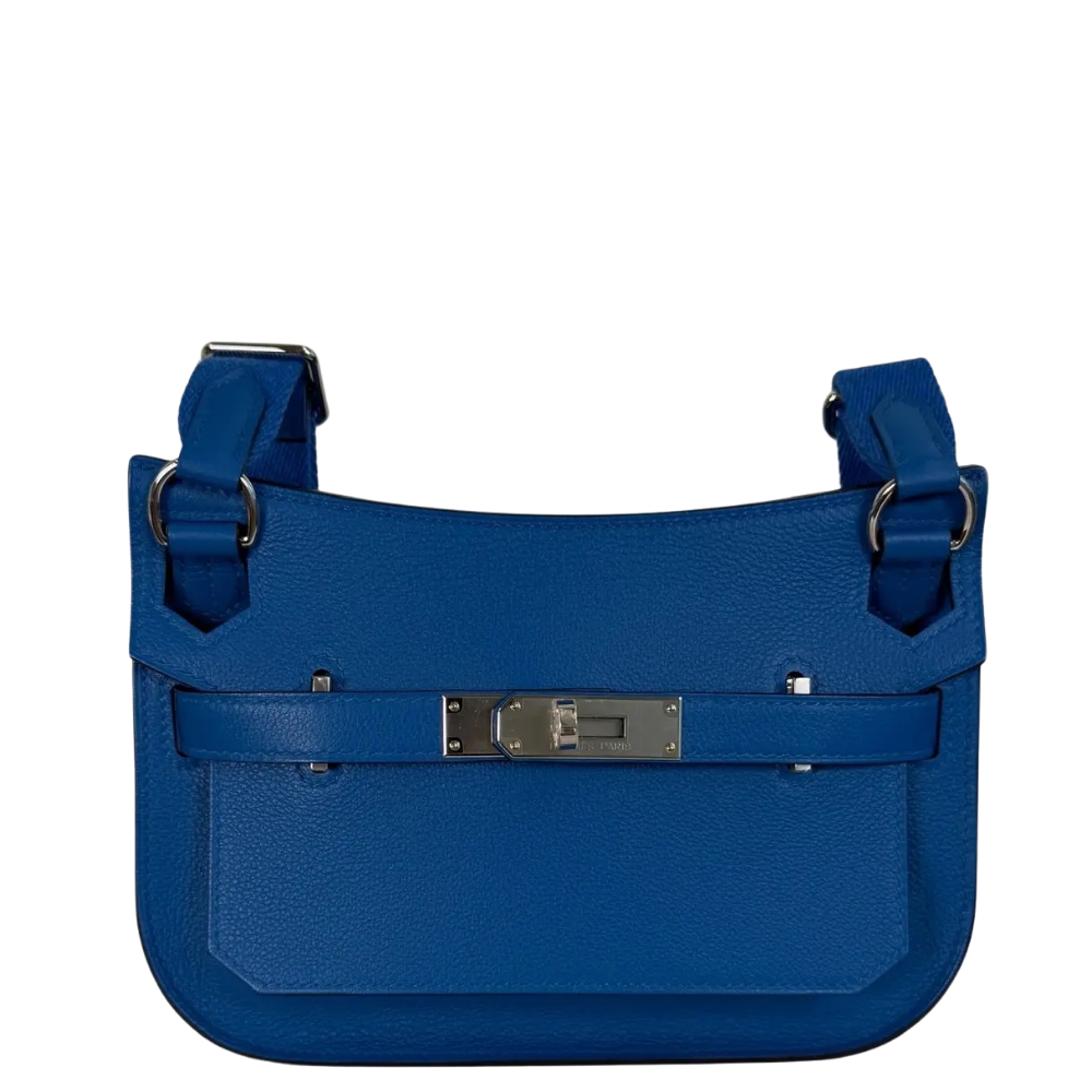 Hermes Mini Jypsiere Blue Zellige Evercolor front view, showcasing the saddle-inspired flap silhouette, signature swivel clasp, and shoulder strap.